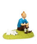 Figura Tintín i Milú asseguts a l'herba