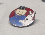 Pin redondo Tint�n Loto azul y Mil�