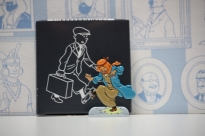 Figurita met�lica Oro Negro. 6 cms altura