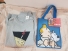 Pack sudadera gris claro + bolsa azul plástico y set postales luna Pack sudadera gris claro + bolsa azul plástico y set postales luna