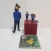 Lot Fig. Cap. Haddock (Museu Imag.) + Dues figures PVC + calendari 2022